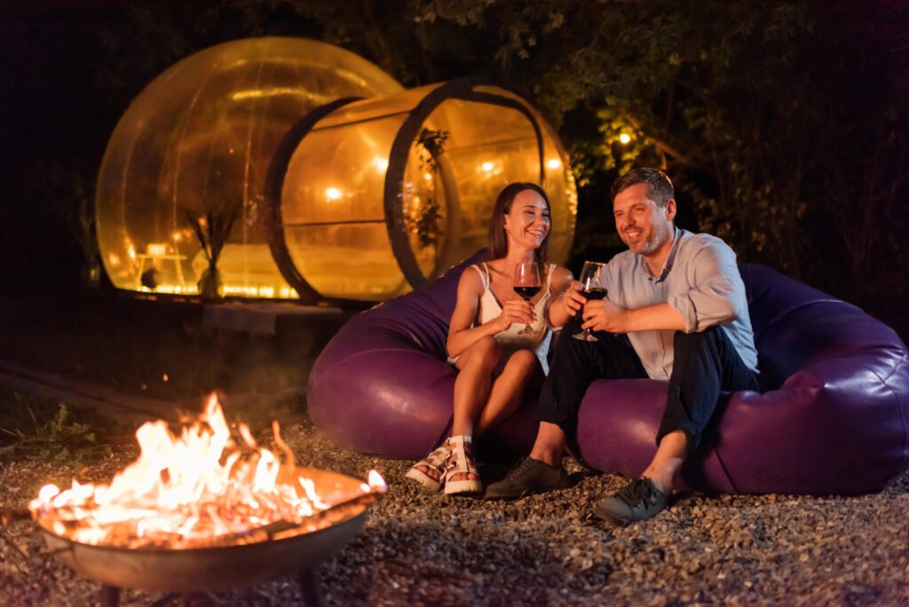 couple enjoying their time in glamping