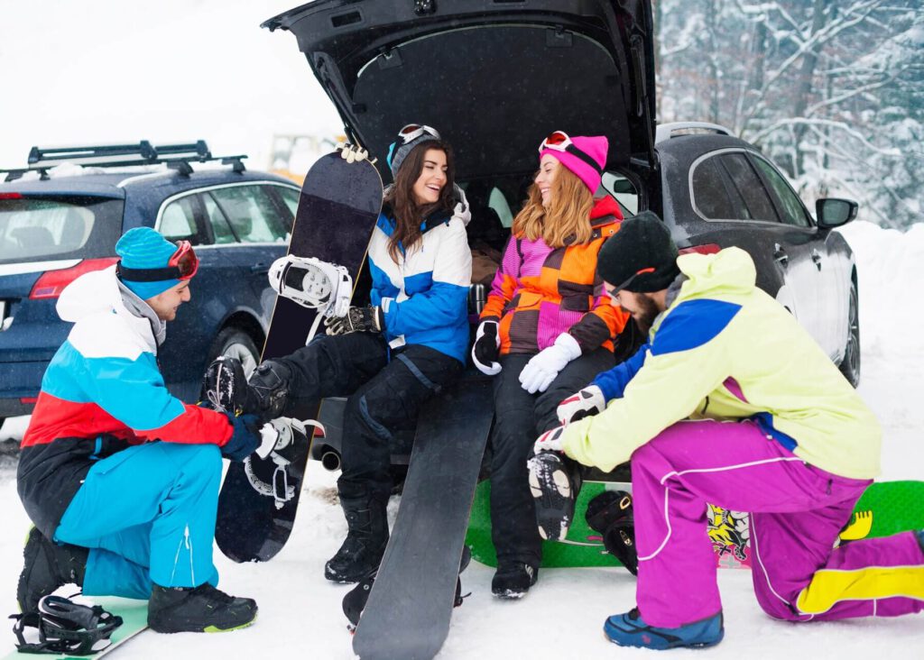 winter date ideas: two couples having fun and planning to go to ski